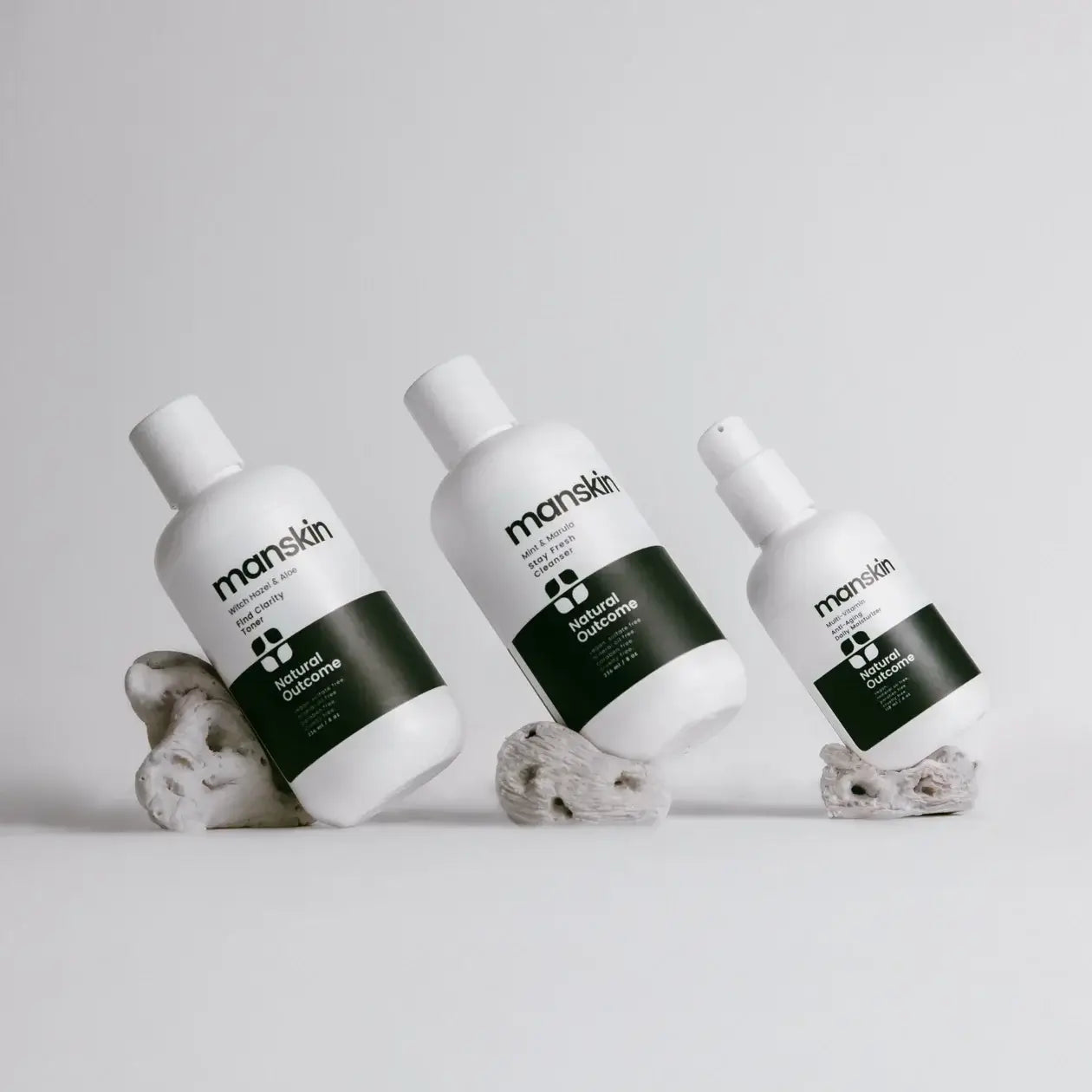 Man Skin Kit featuring Stay Fresh Face Wash, Find Clarity Toner, and Multi Vitamin Moisturizer on a neutral background.
